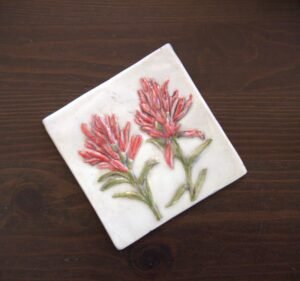 Hand-painted 4 inch Indian Paintbrush ceramic accent tile from the Meadow Bloom collection by Fire Creek Clay.