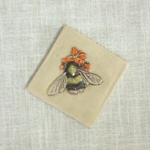 Bumblebee sitting an orange wildflower. 4 inch tile