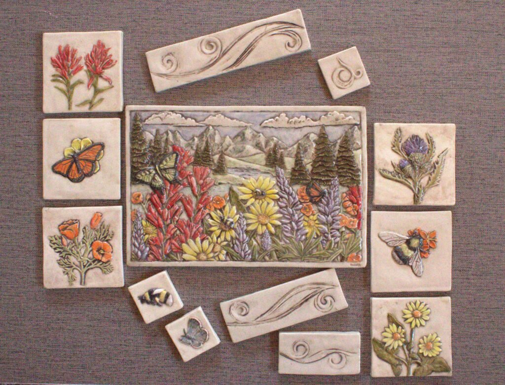 Collection photo of the hand carved and hand painted Meadow Bloom ceramic art tile.