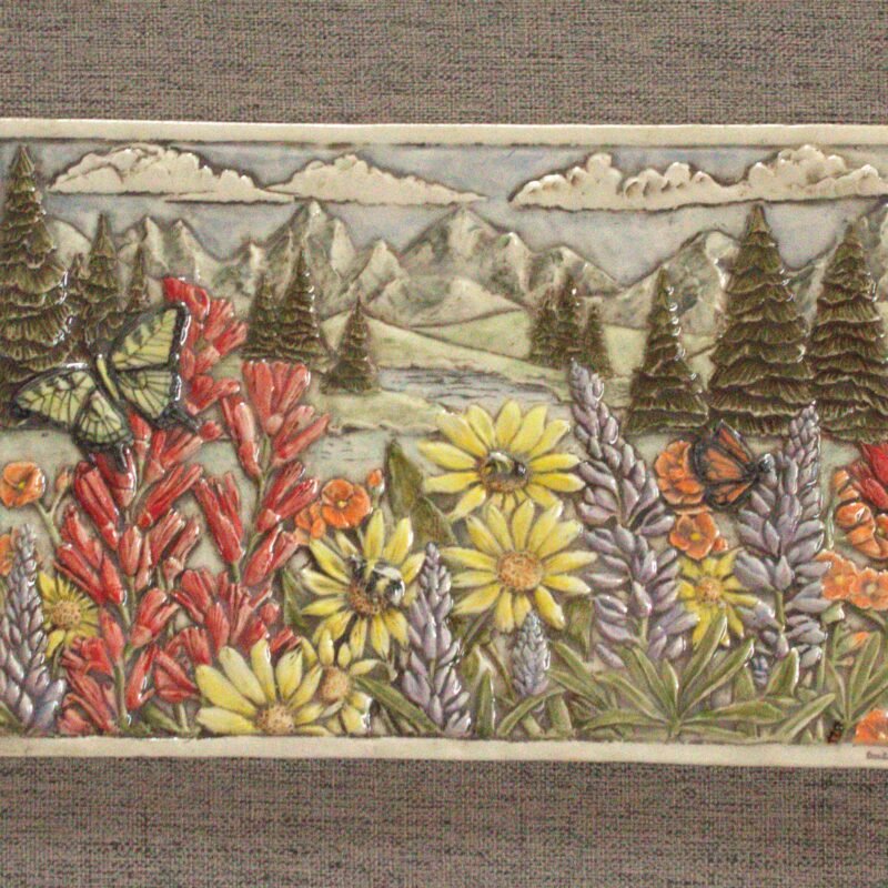 8x12 inch hand carved and hand painted mountain meadow tile
